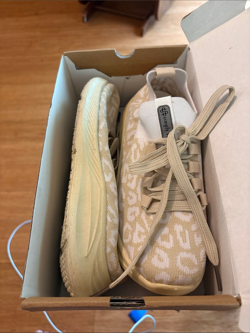 tan leopard-print knit sneakers by Simply Southern, one is cleaner than the othe